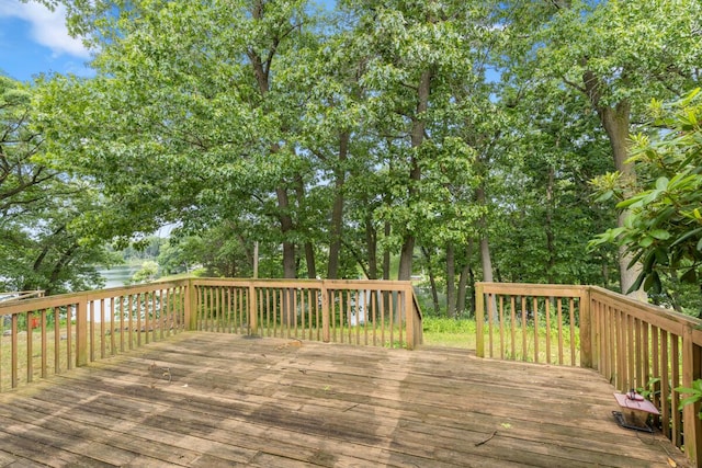 2647 Manitoba Ct NE, Grand Rapids, MI 49525 - deck featuring view of wooded area