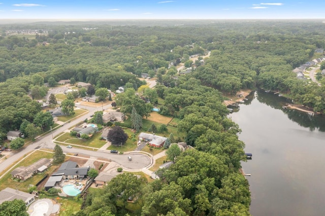 2647 Manitoba Ct NE, Grand Rapids, MI 49525 - aerial overview of property's location featuring a nearby body of water and a forest