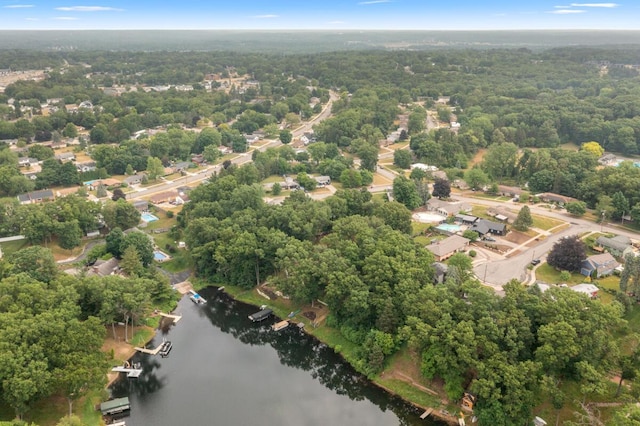 2647 Manitoba Ct NE, Grand Rapids, MI 49525 - view of property location with a nearby body of water and a heavily wooded area