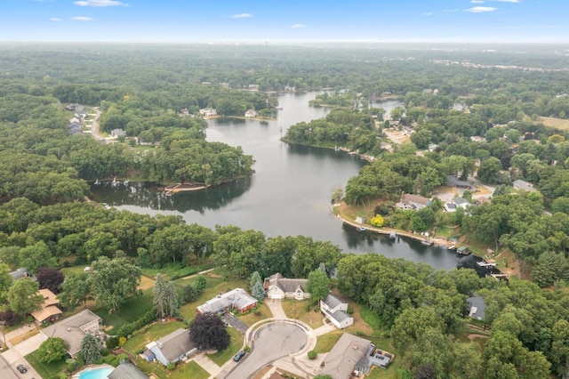 2647 Manitoba Ct NE, Grand Rapids, MI 49525 - aerial view of property and surrounding area featuring a nearby body of water and a forest