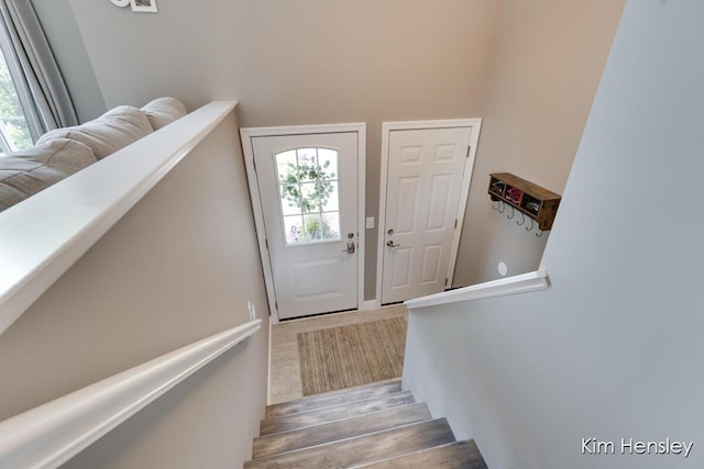 4284 Ives Farm Ln NE, Cedar Springs, MI 49319 - staircase featuring plenty of natural light and wood finished floors