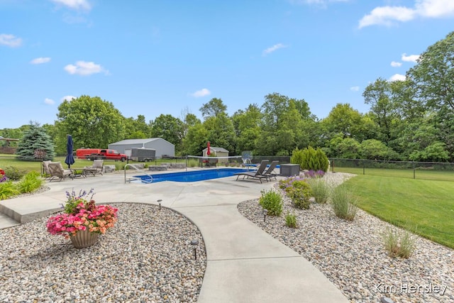 4284 Ives Farm Ln NE, Cedar Springs, MI 49319 - view of swimming pool with a patio and view of wooded area