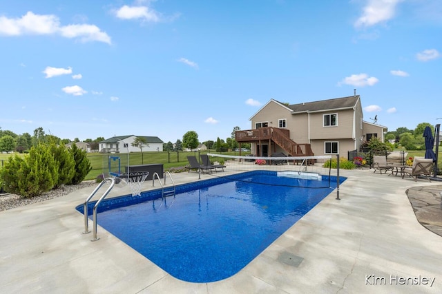 4284 Ives Farm Ln NE, Cedar Springs, MI 49319 - swimming pool featuring stairs, a patio, and a deck