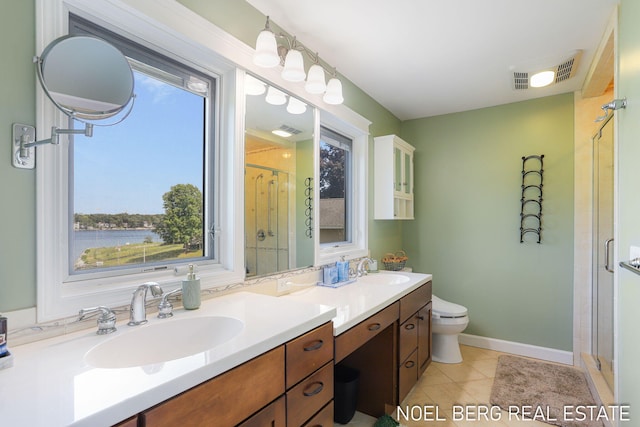 16093 Harbor Point Dr, Spring Lake, MI 49456 - full bathroom featuring a shower stall, double vanity, and tile patterned flooring