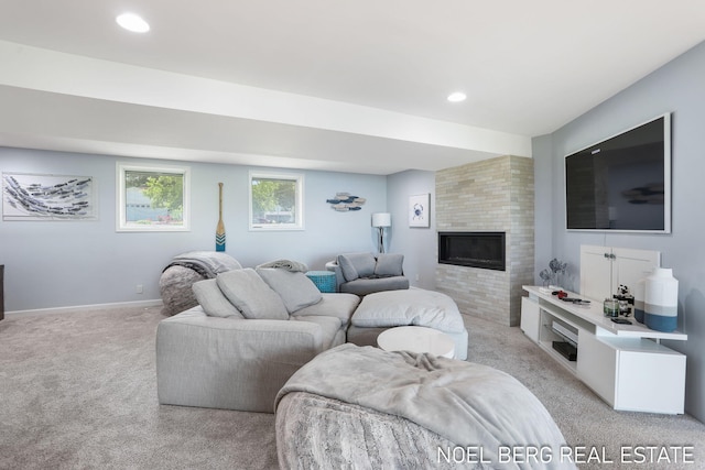 16093 Harbor Point Dr, Spring Lake, MI 49456 - living room with light colored carpet, a large fireplace, and recessed lighting