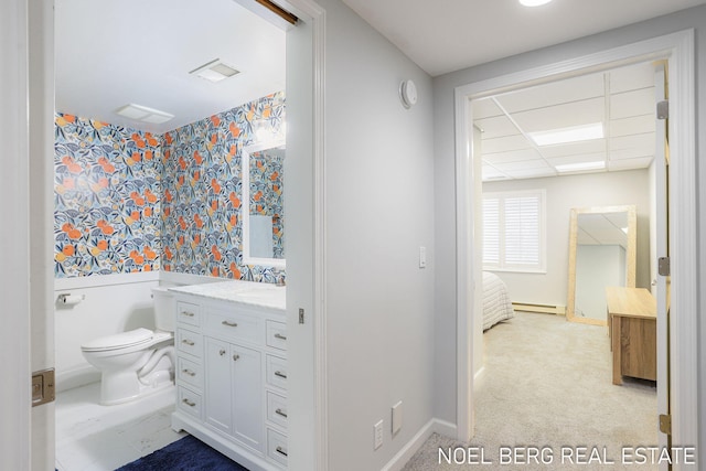 16093 Harbor Point Dr, Spring Lake, MI 49456 - bathroom featuring wallpapered walls, vanity, and a baseboard heating unit