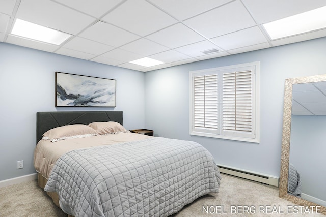 16093 Harbor Point Dr, Spring Lake, MI 49456 - bedroom with a baseboard radiator, carpet, and a drop ceiling