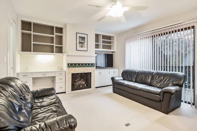 22 Haverhill Ct, Ann Arbor, MI 48105 - carpeted living area with a ceiling fan and a premium fireplace