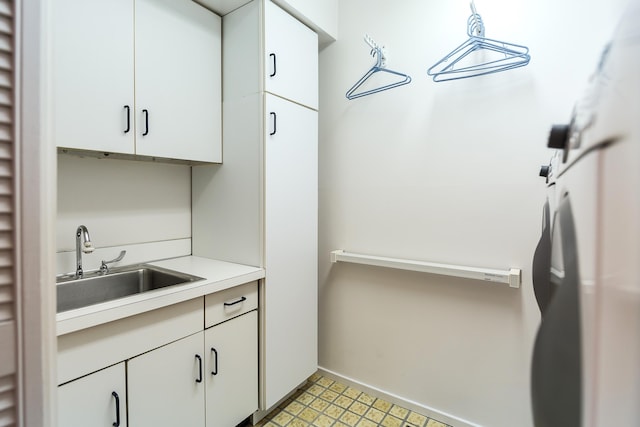 22 Haverhill Ct, Ann Arbor, MI 48105 - kitchen with light countertops and white cabinetry