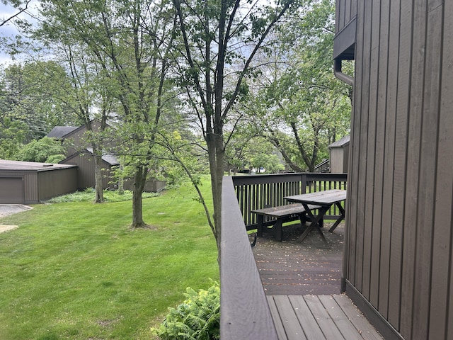 22 Haverhill Ct, Ann Arbor, MI 48105 - wooden terrace featuring a lawn and outdoor dining area