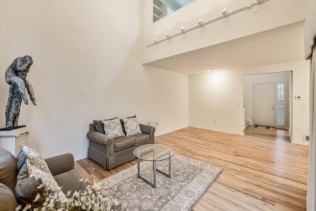 22 Haverhill Ct, Ann Arbor, MI 48105 - living room featuring wood finished floors and baseboards