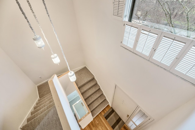 22 Haverhill Ct, Ann Arbor, MI 48105 - stairs featuring a towering ceiling