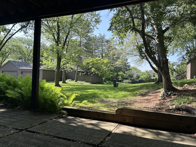 22 Haverhill Ct, Ann Arbor, MI 48105 - view of green lawn with an outbuilding