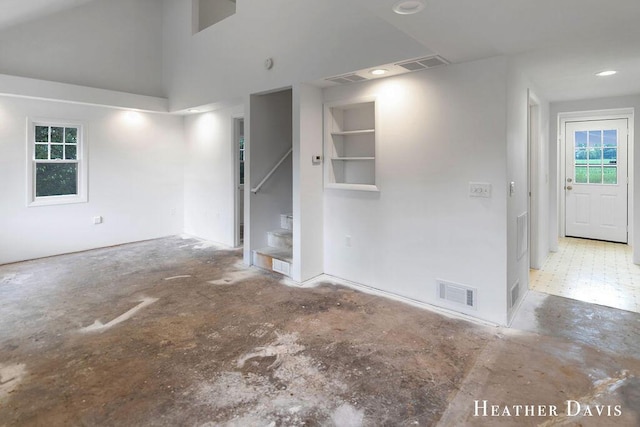 4578 135th Ave, Hamilton, MI 49419 - spare room featuring stairway and unfinished concrete flooring