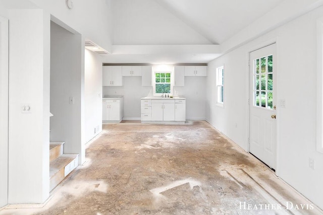 4578 135th Ave, Hamilton, MI 49419 - kitchen featuring lofted ceiling and white cabinetry