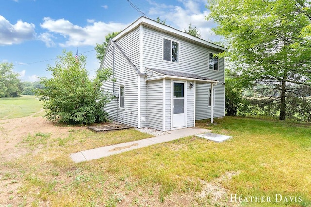 4578 135th Ave, Hamilton, MI 49419 - back of house with a yard