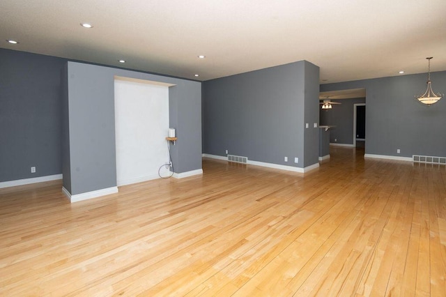 5412 Blackberry Ln, Coloma, MI 49038 - unfurnished room featuring light wood finished floors, ceiling fan, and recessed lighting