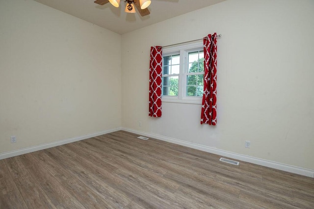 5412 Blackberry Ln, Coloma, MI 49038 - empty room featuring wood finished floors and a ceiling fan