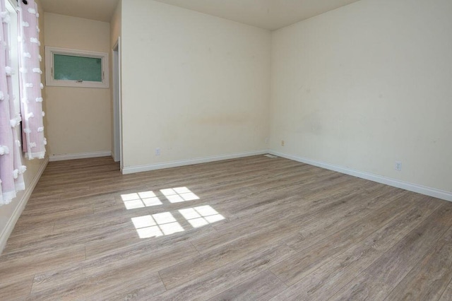 5412 Blackberry Ln, Coloma, MI 49038 - empty room with light wood-style floors and baseboards