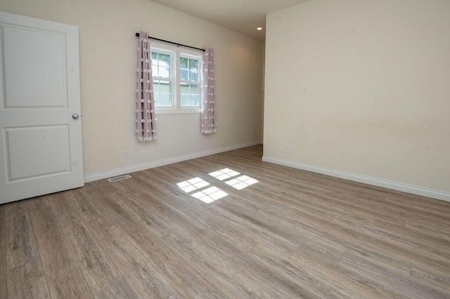 5412 Blackberry Ln, Coloma, MI 49038 - spare room with light wood-style floors and baseboards