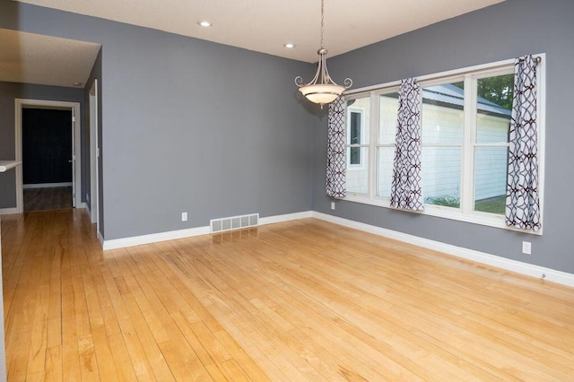5412 Blackberry Ln, Coloma, MI 49038 - spare room featuring hardwood / wood-style floors and recessed lighting