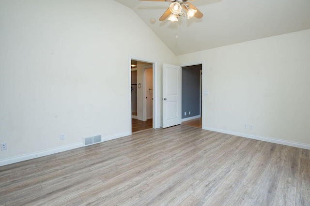 5412 Blackberry Ln, Coloma, MI 49038 - empty room featuring ceiling fan, light wood finished floors, and high vaulted ceiling