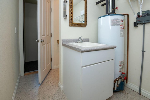 5412 Blackberry Ln, Coloma, MI 49038 - utility room featuring gas water heater and a sink