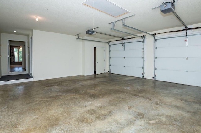 5412 Blackberry Ln, Coloma, MI 49038 - garage featuring a garage door opener