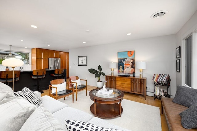 4330 Eastgate Dr, Ann Arbor, MI 48103 - living room with light wood-style flooring and recessed lighting
