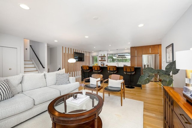 4330 Eastgate Dr, Ann Arbor, MI 48103 - living room with light wood-style flooring, stairs, and recessed lighting