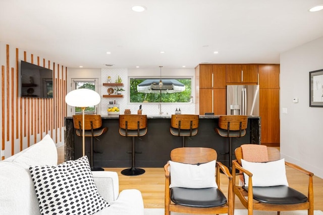 4330 Eastgate Dr, Ann Arbor, MI 48103 - living area featuring light wood-style flooring and recessed lighting