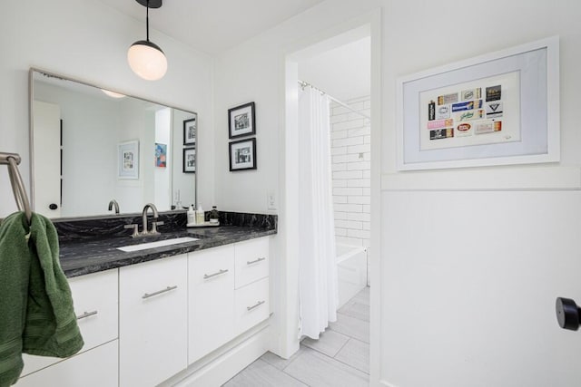 4330 Eastgate Dr, Ann Arbor, MI 48103 - full bathroom featuring vanity, shower / bath combo with shower curtain, and tile patterned flooring