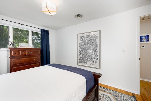 4330 Eastgate Dr, Ann Arbor, MI 48103 - bedroom featuring wood finished floors and baseboards