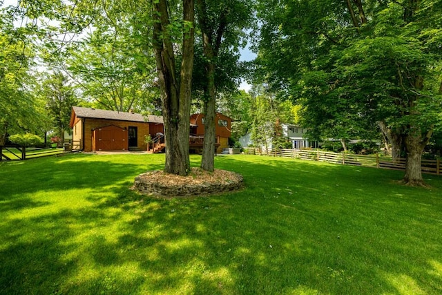 4330 Eastgate Dr, Ann Arbor, MI 48103 - view of yard featuring a wooden deck