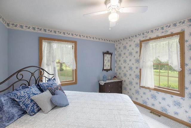 7272 E M 113, Kingsley, MI 49649 - carpeted bedroom with baseboards and ceiling fan