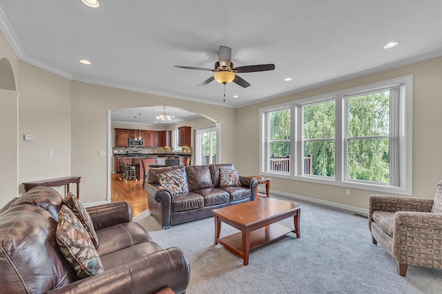 50501 Elmwood Ct, Plymouth, MI 48170 - living room with arched walkways, recessed lighting, a ceiling fan, and crown molding