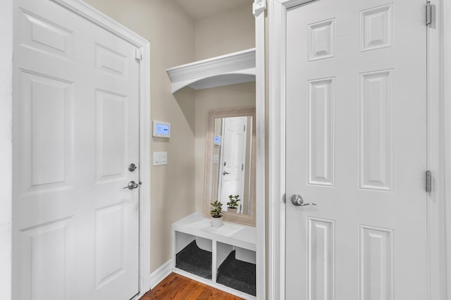 50501 Elmwood Ct, Plymouth, MI 48170 - mudroom with arched walkways and dark wood-style floors