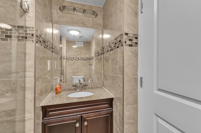 50501 Elmwood Ct, Plymouth, MI 48170 - bathroom with vanity and tile walls