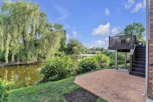 50501 Elmwood Ct, Plymouth, MI 48170 - view of yard featuring stairs, a patio, and a deck with water view