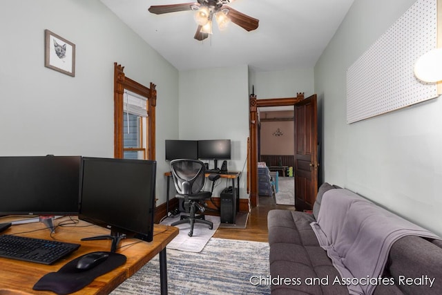 13872 Hastings Rd, Freeport, MI 49325 - office area with wood finished floors and ceiling fan