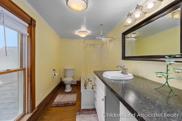 13872 Hastings Rd, Freeport, MI 49325 - full bathroom with wood finished floors, vanity, a shower with curtain, and crown molding