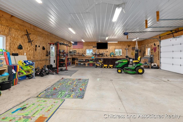 13872 Hastings Rd, Freeport, MI 49325 - garage featuring a workshop area