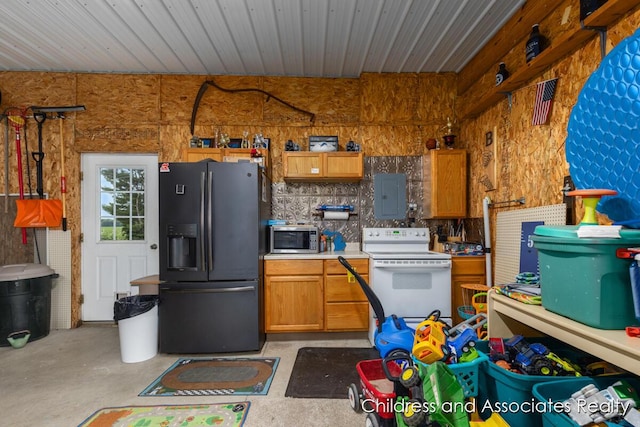 13872 Hastings Rd, Freeport, MI 49325 - kitchen featuring refrigerator with ice dispenser, electric stove, stainless steel microwave, electric panel, and concrete floors
