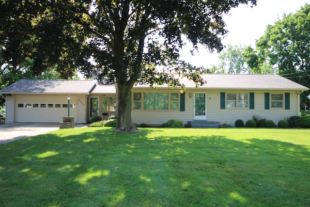 6426 Westchester St, Portage, MI 49024 - ranch-style house featuring an attached garage, driveway, and a front yard
