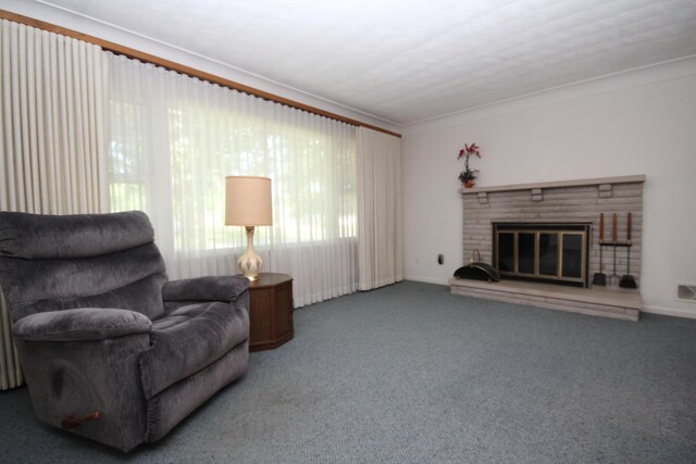 6426 Westchester St, Portage, MI 49024 - carpeted living area with crown molding and a fireplace