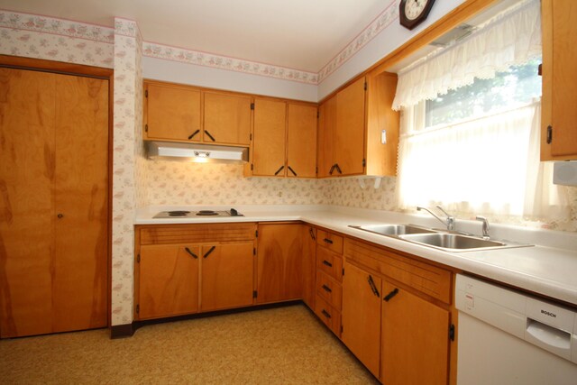 6426 Westchester St, Portage, MI 49024 - kitchen featuring white appliances, wallpapered walls, under cabinet range hood, light countertops, and light flooring