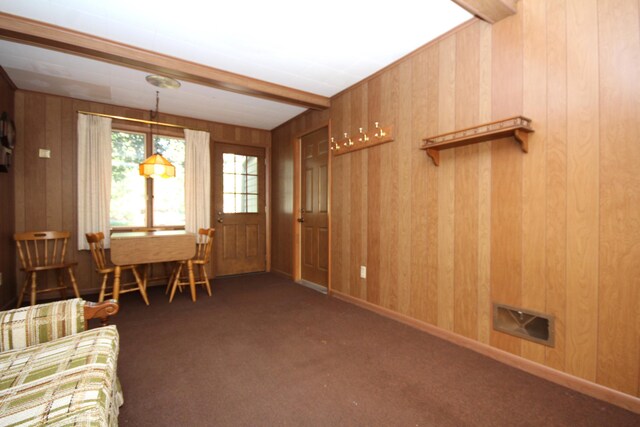 6426 Westchester St, Portage, MI 49024 - living room featuring wooden walls and carpet flooring