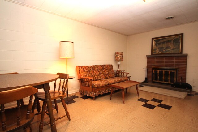 6426 Westchester St, Portage, MI 49024 - living area featuring a fireplace and concrete block wall