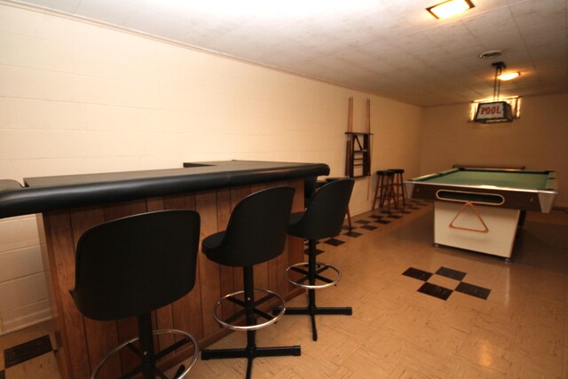6426 Westchester St, Portage, MI 49024 - indoor dry bar with billiards, concrete block wall, and light floors