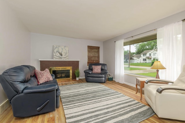 1736 Glenvale Dr SW, Wyoming, MI 49519 - living area featuring a fireplace and wood finished floors
